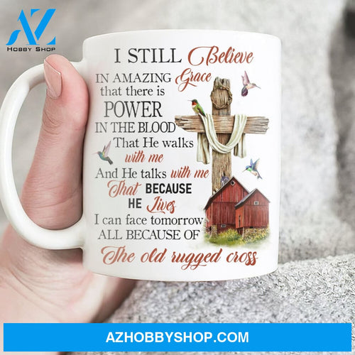 Wooden cross, Red house, Colorful hummingbird, I still believe in amazing grace - Jesus White Mug