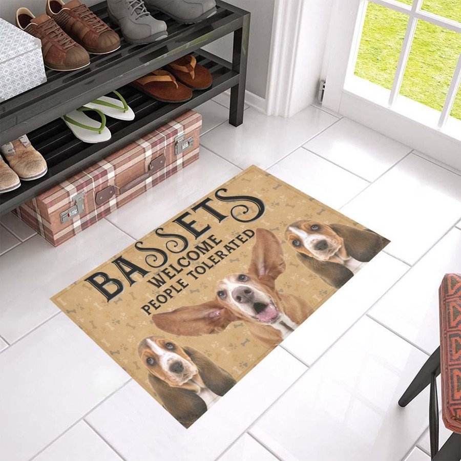 Basset Hound Welcomes Doormat