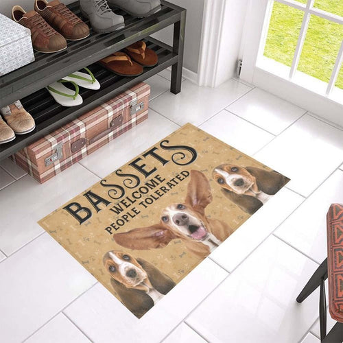 Basset Hound Welcomes Doormat