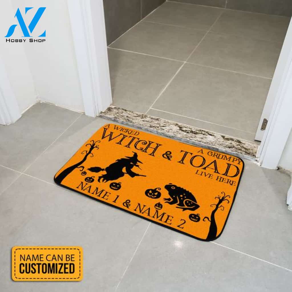 A Wicked Witch And A Grumpy Toad Live Here Rectangular Yellow Doormat