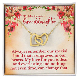 To My Sweetest Granddaughter - Special Bond That Is Engraved In Our Hearts Love, Grandpa & Grandma - Interlocking Hearts Necklace