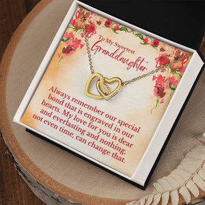 To My Sweetest Granddaughter - Special Bond That Is Engraved In Our Hearts Love, Grandpa & Grandma - Interlocking Hearts Necklace