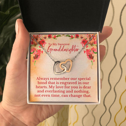 To My Sweetest Granddaughter - Special Bond That Is Engraved In Our Hearts Love, Grandpa & Grandma - Interlocking Hearts Necklace