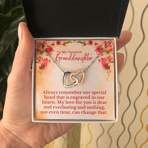 To My Sweetest Granddaughter - Special Bond That Is Engraved In Our Hearts Love, Grandpa & Grandma - Interlocking Hearts Necklace