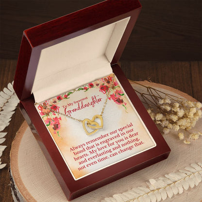 To My Sweetest Granddaughter - Special Bond That Is Engraved In Our Hearts Love, Grandpa & Grandma - Interlocking Hearts Necklace