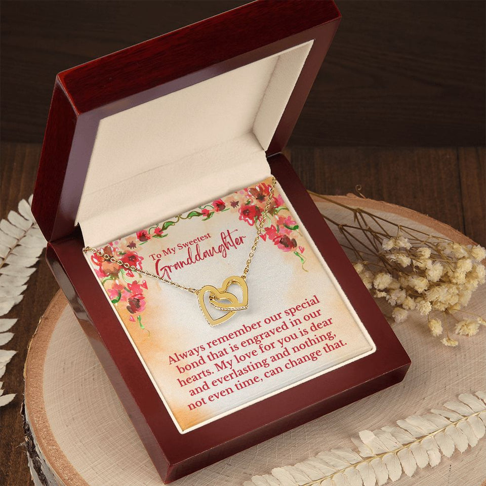 To My Sweetest Granddaughter - Special Bond That Is Engraved In Our Hearts Love, Grandpa & Grandma - Interlocking Hearts Necklace