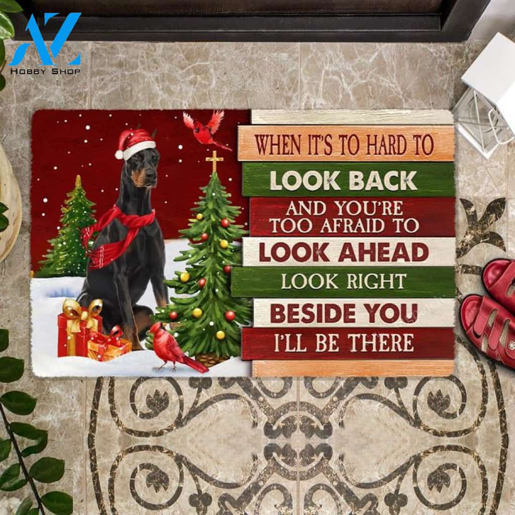 Christmas Doberman 2 Look right beside you Doormat