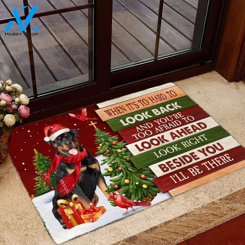 Christmas Rottweiler 1 Look right beside you Doormat