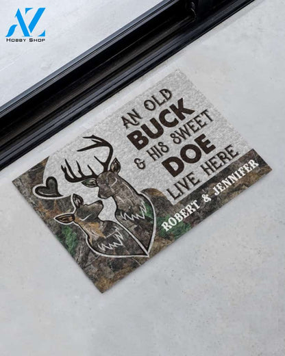 Deer an old buck and his sweet doe live here doormat