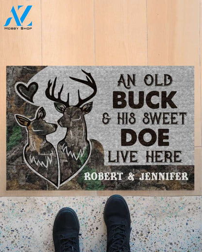 Deer an old buck and his sweet doe live here doormat