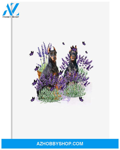 Doberman Pinscher with lavender flower poster