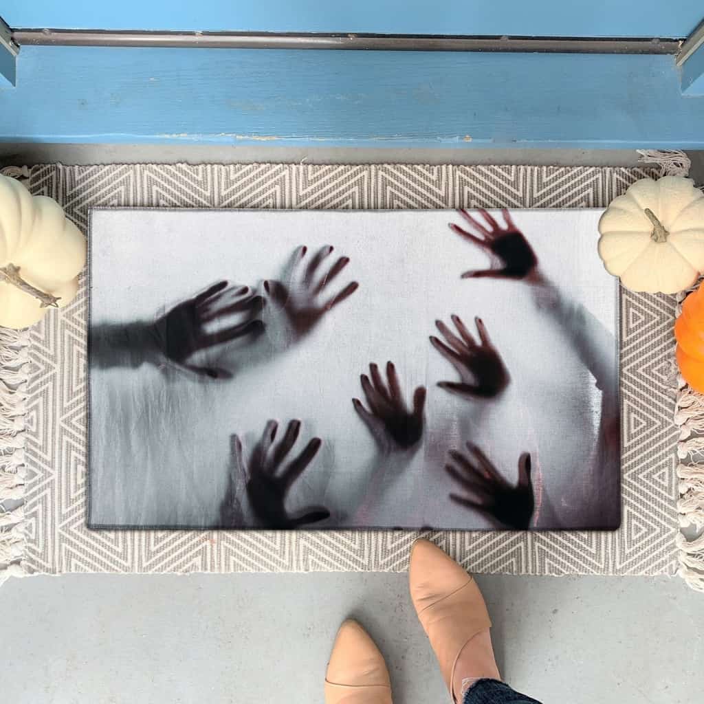 HANDS UNDER GLASS DOORMAT