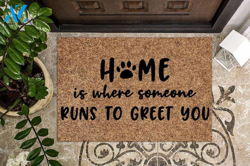 Home is Where someone runs to greet you Dog Doormat