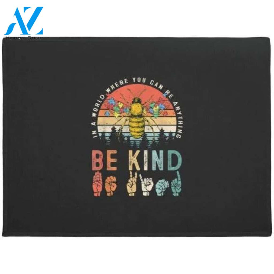 in a world where you can be anything be kind Gift Doormat