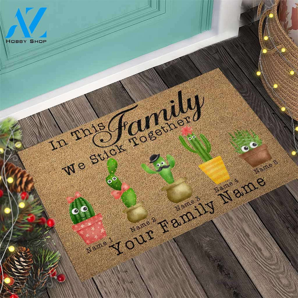 In This Family We Stick Together - Cactus Doormat
