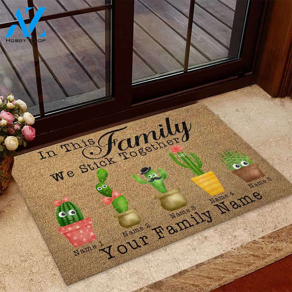 In This Family We Stick Together - Cactus Doormat