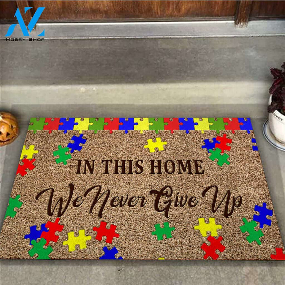 In This Home We Never Give Up - Autism Awareness Coir Pattern Print Doormat