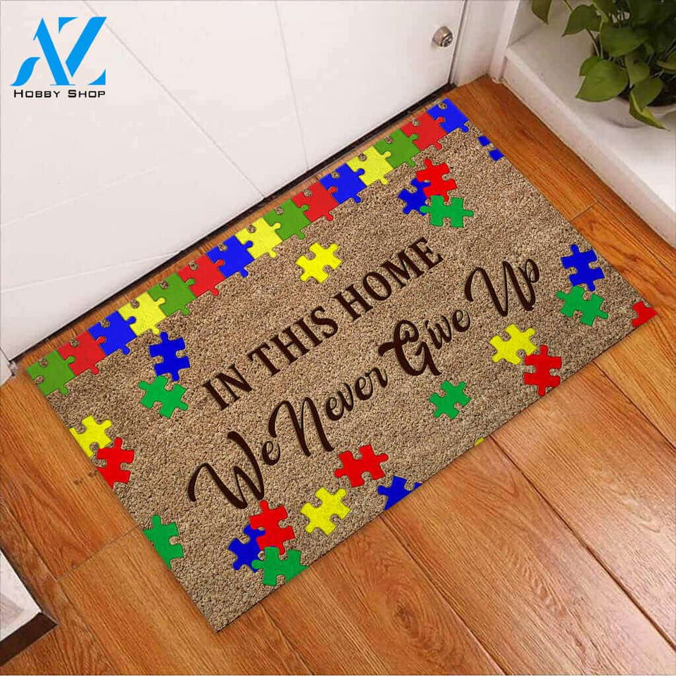 In This Home We Never Give Up - Autism Awareness Coir Pattern Print Doormat
