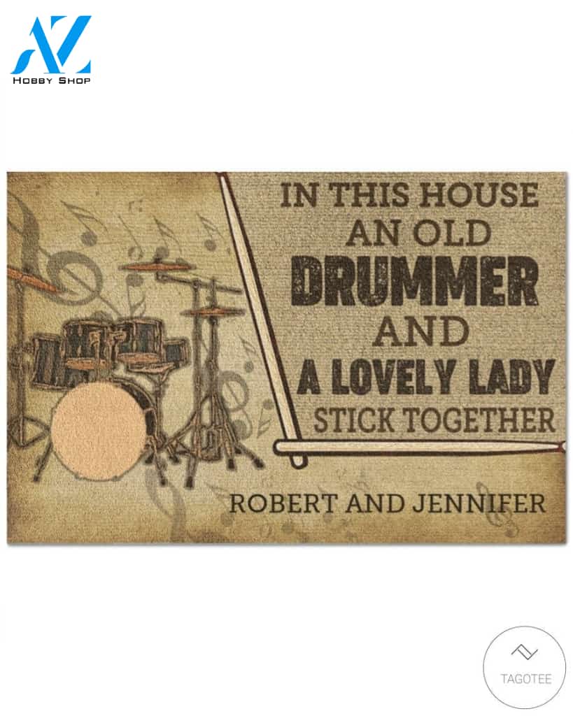 Personalized In this house and old drummer and a lovely lady stick together doormat
