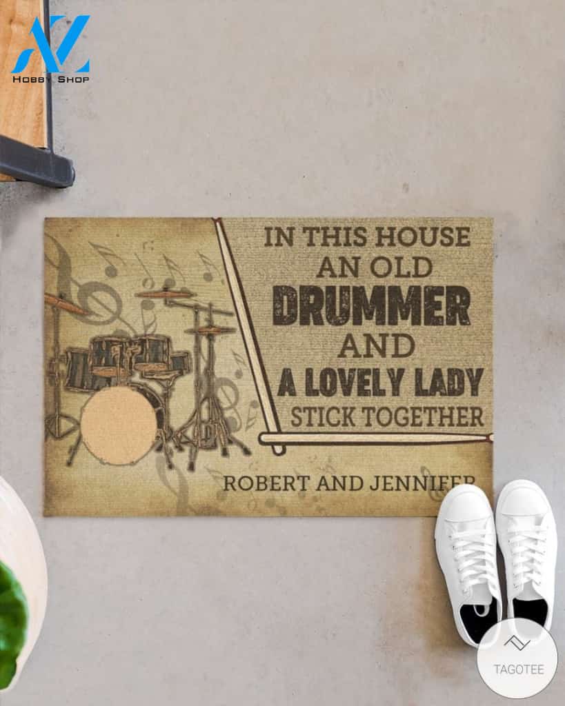 Personalized In this house and old drummer and a lovely lady stick together doormat