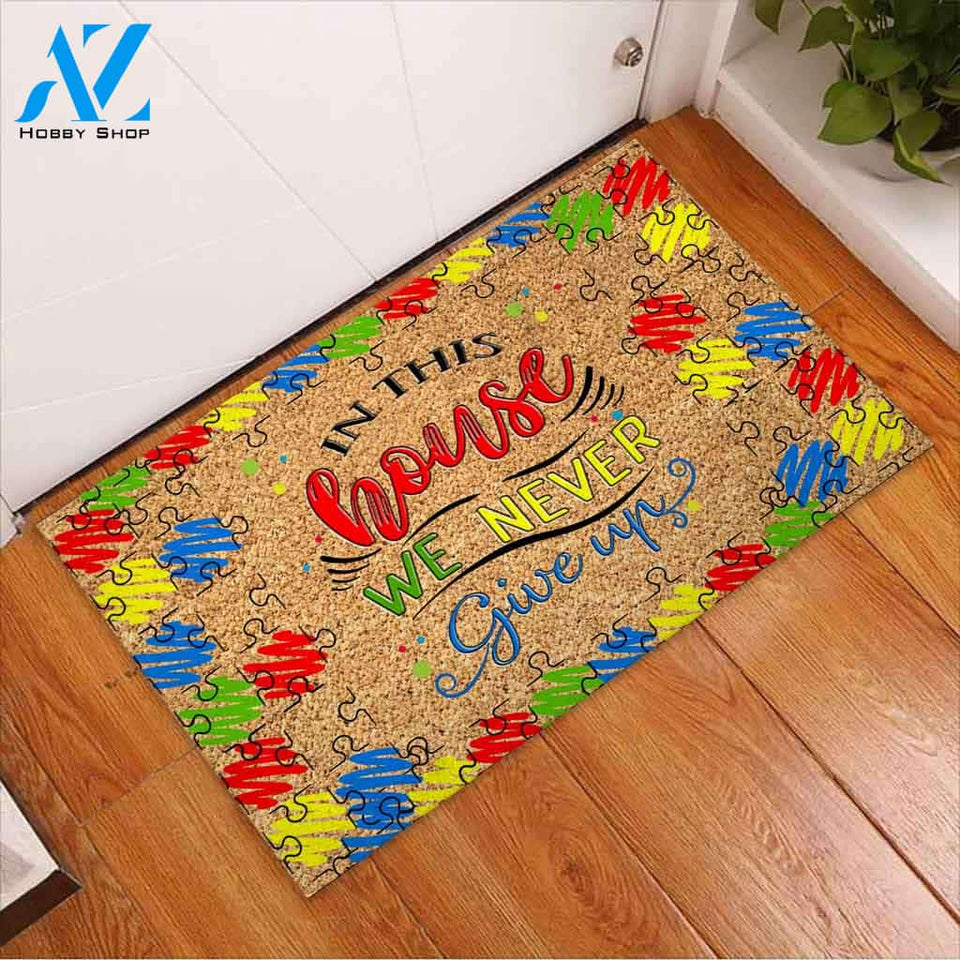 In This House We Never Give Up - Autism Awareness Coir Pattern Print Doormat