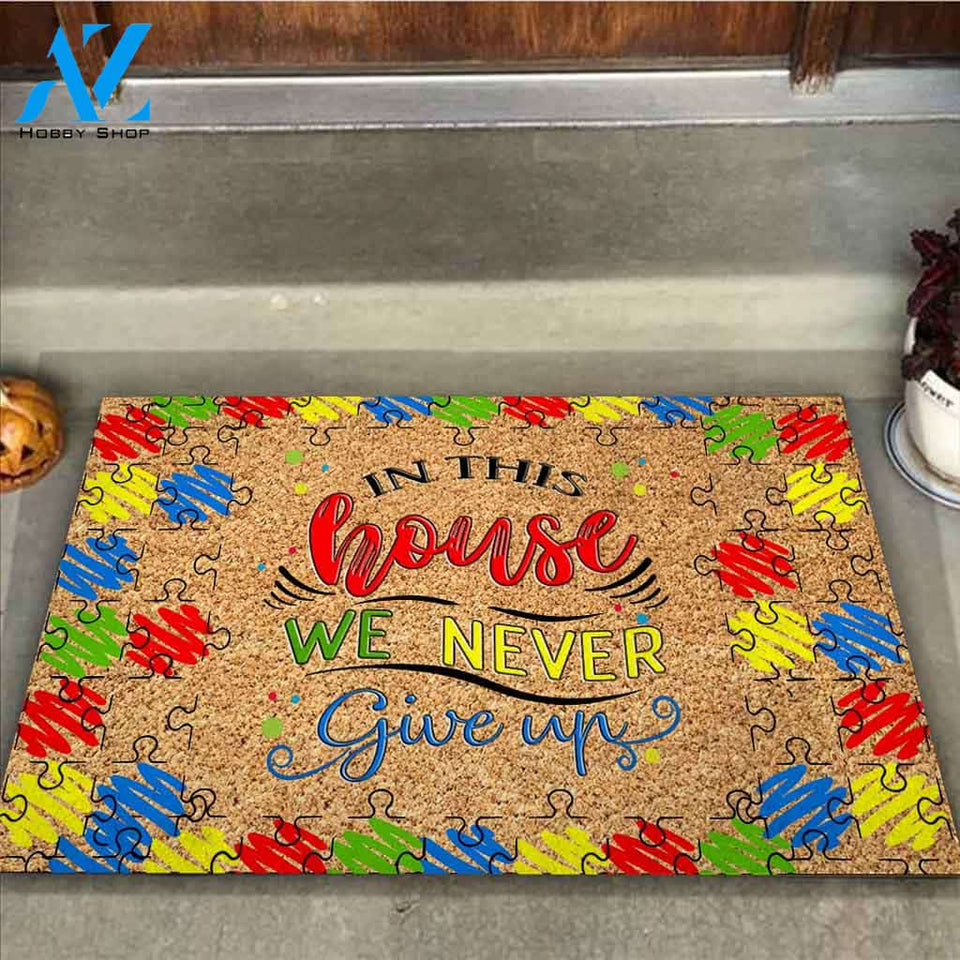 In This House We Never Give Up - Autism Awareness Coir Pattern Print Doormat