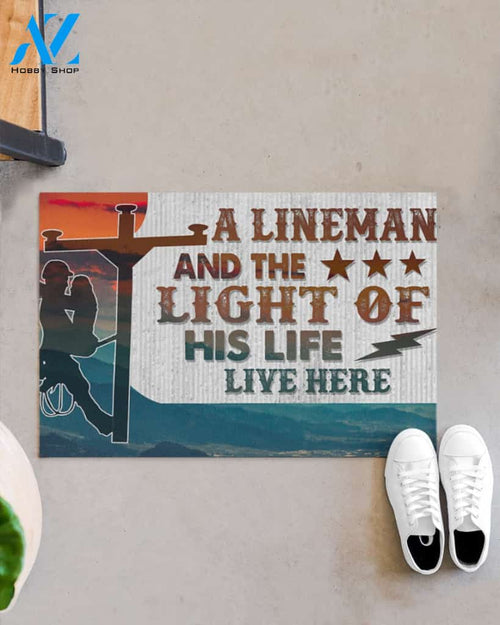 Personalized Lineman and the light of his life live here Doormat