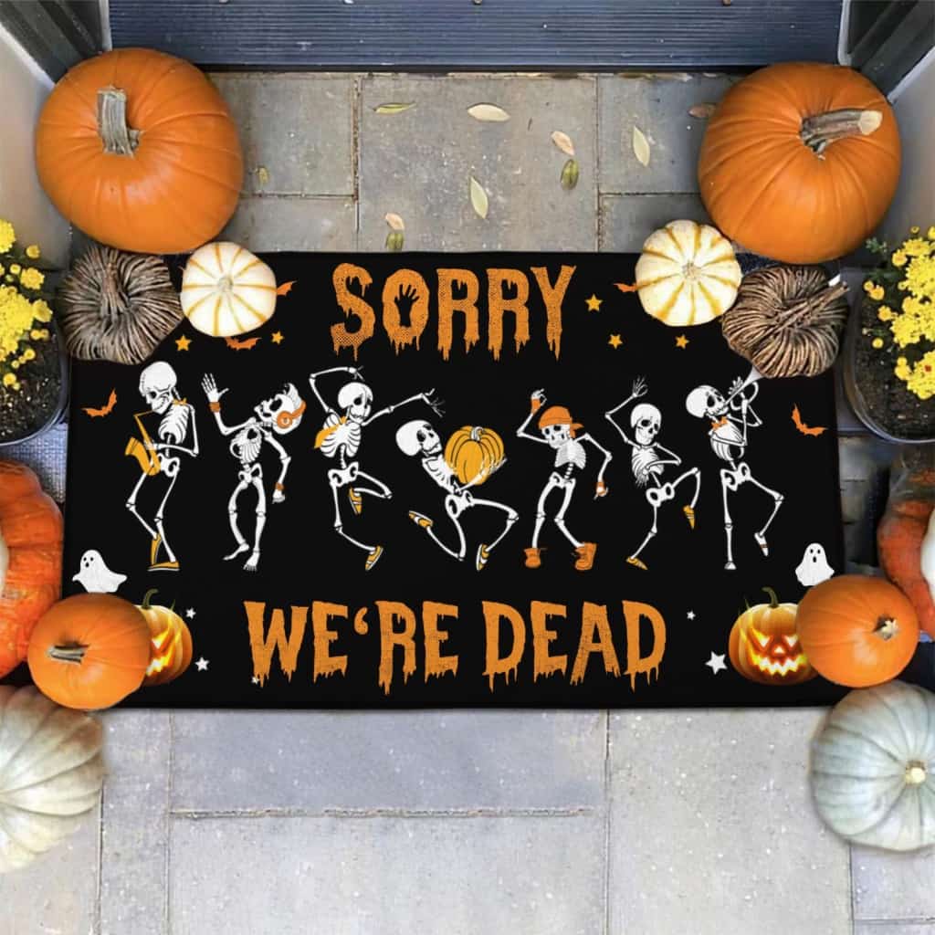 SORRY WE'RE DEAD SKELETON DOORMAT