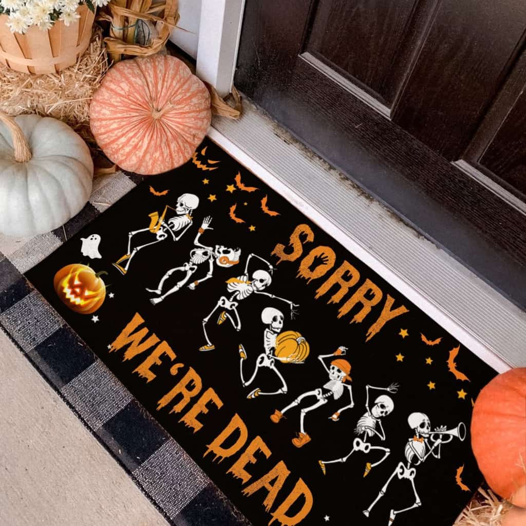 SORRY WE'RE DEAD SKELETON DOORMAT
