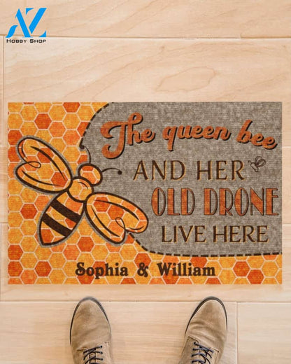 The queen bee and her old drone live here doormat