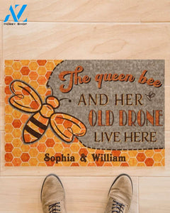 The queen bee and her old drone live here doormat