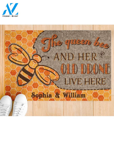 The queen bee and her old drone live here doormat