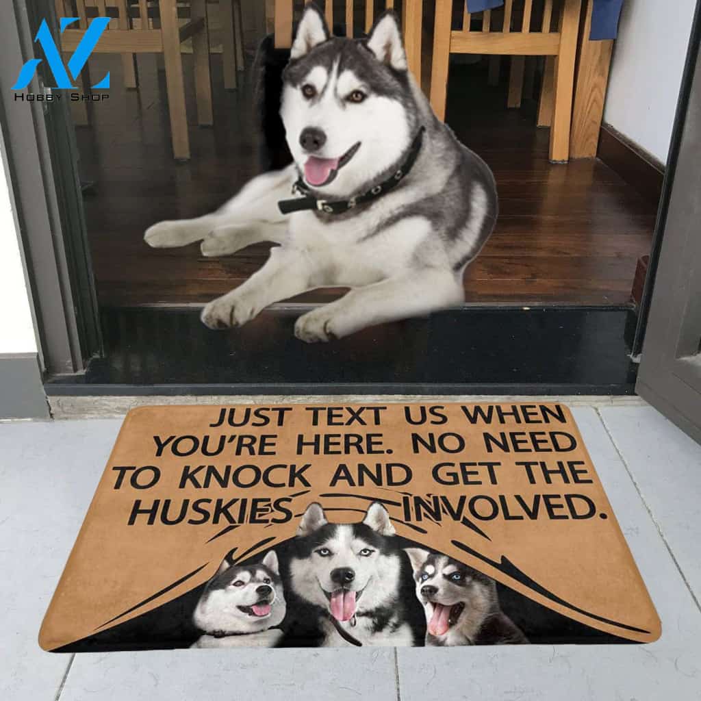 TO KNOCK AND GET THE HUSKIES INVOLVED Doormat 23.6