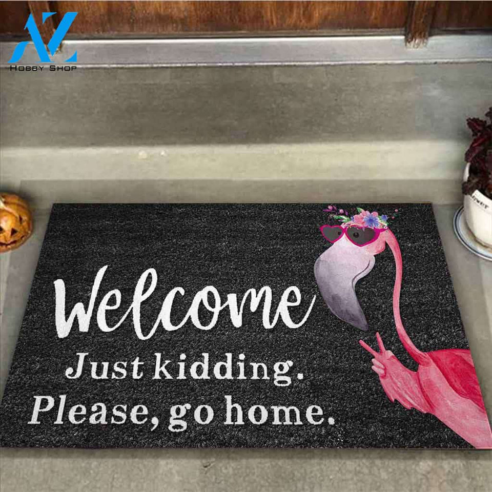 Welcome Just Kidding - Flamingo Doormat