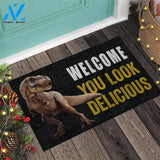 Welcome You Look Delicious - Dinosaur Doormat