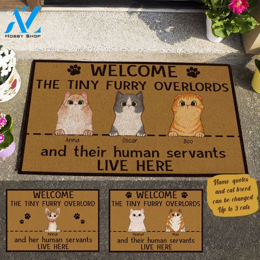 Witty cat, Welcome The Tiny Furry Overlords And Human Servants Live Here Personalized Doormat